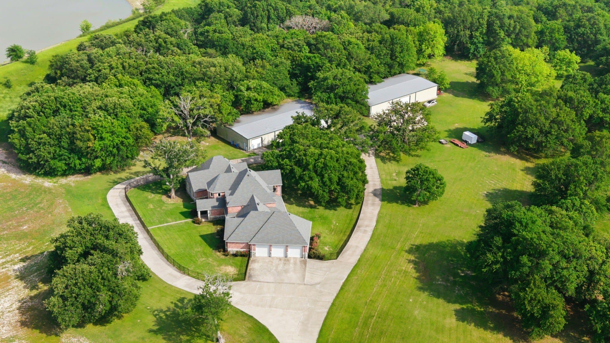 Long aerial perspective over Brigance primary site fields