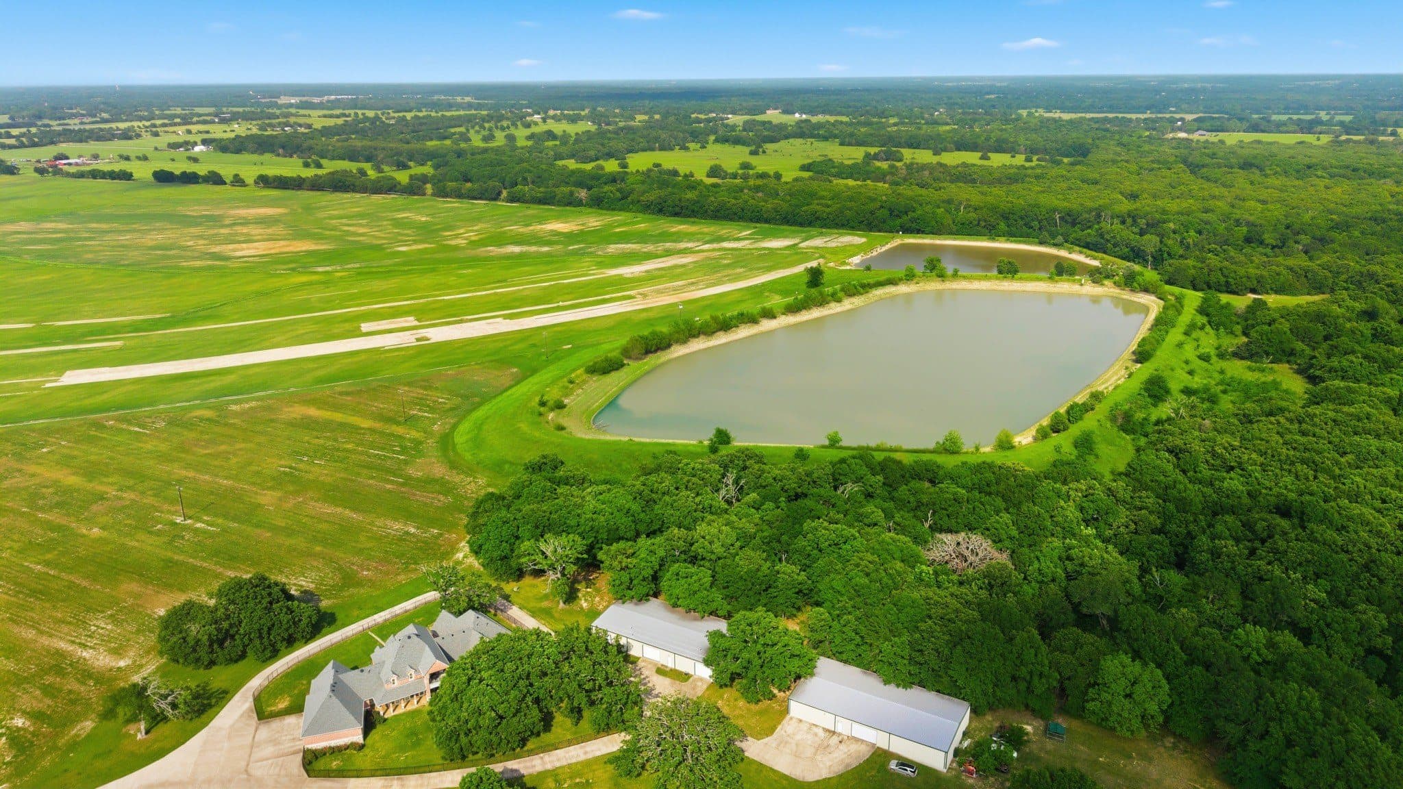 Aerial view showing irrigation pond at the primary site