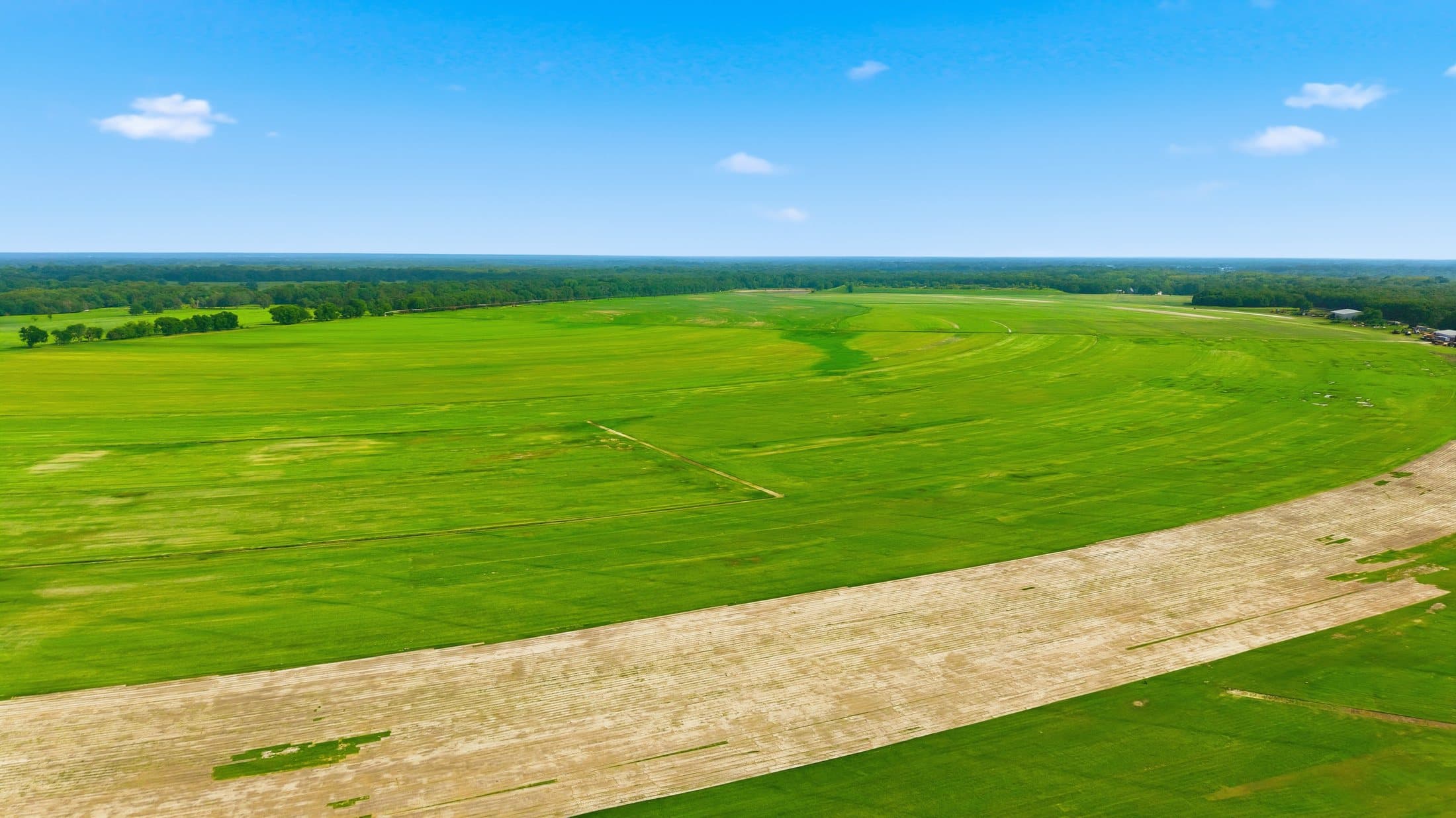 Summer aerial of the wider cultivated landscape at the primary site